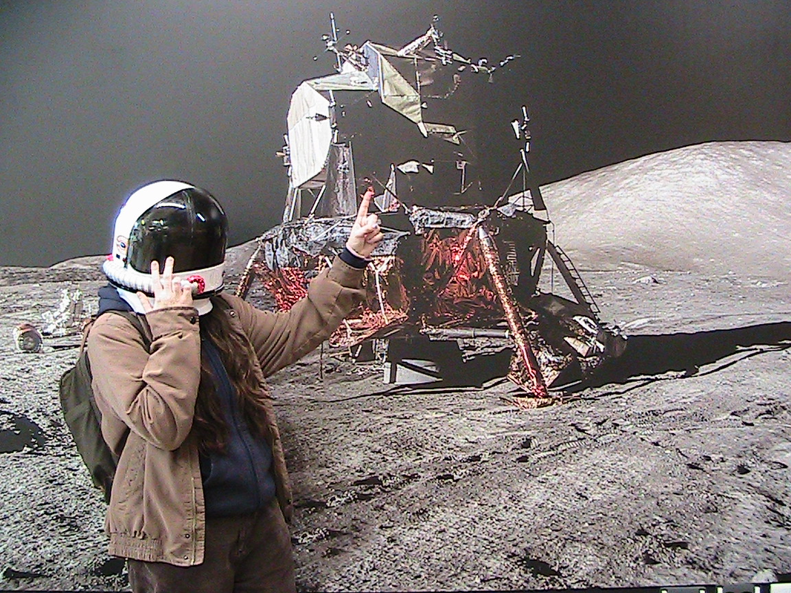 me wearing a kids  space helmet