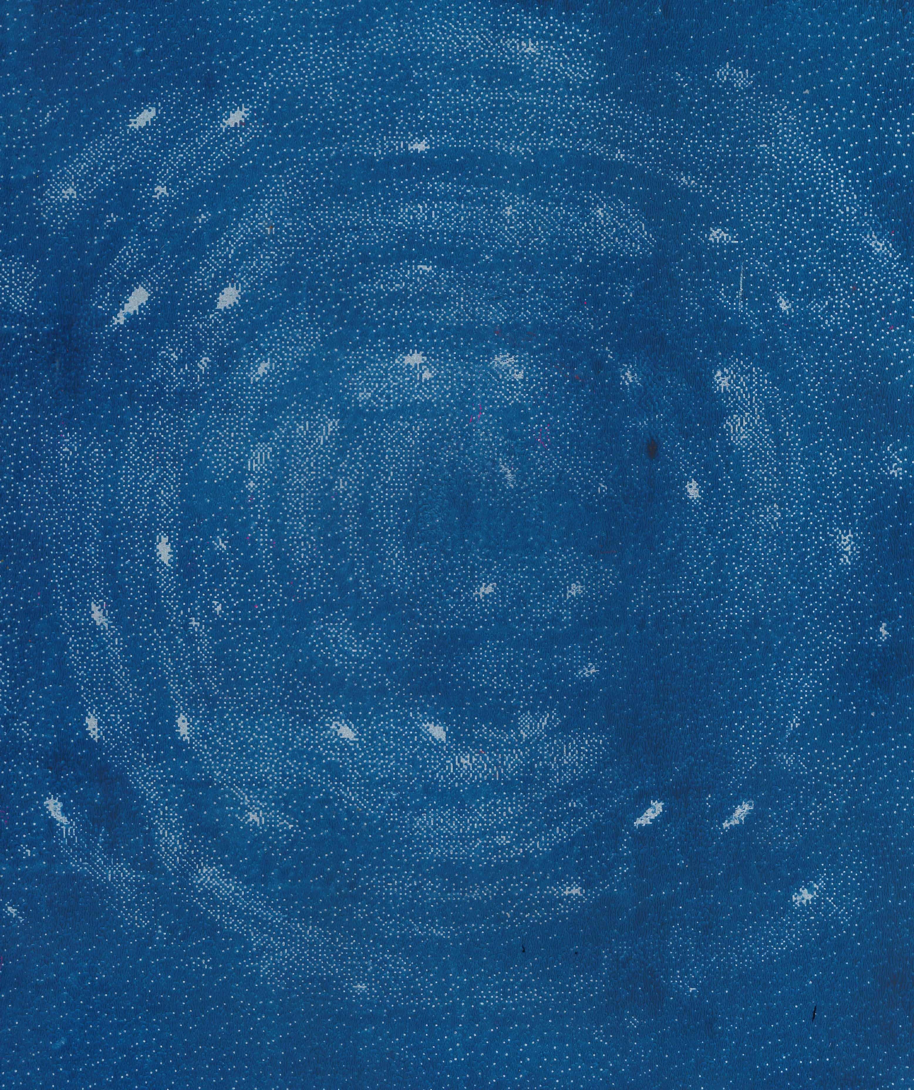 a print of a blue galaxy