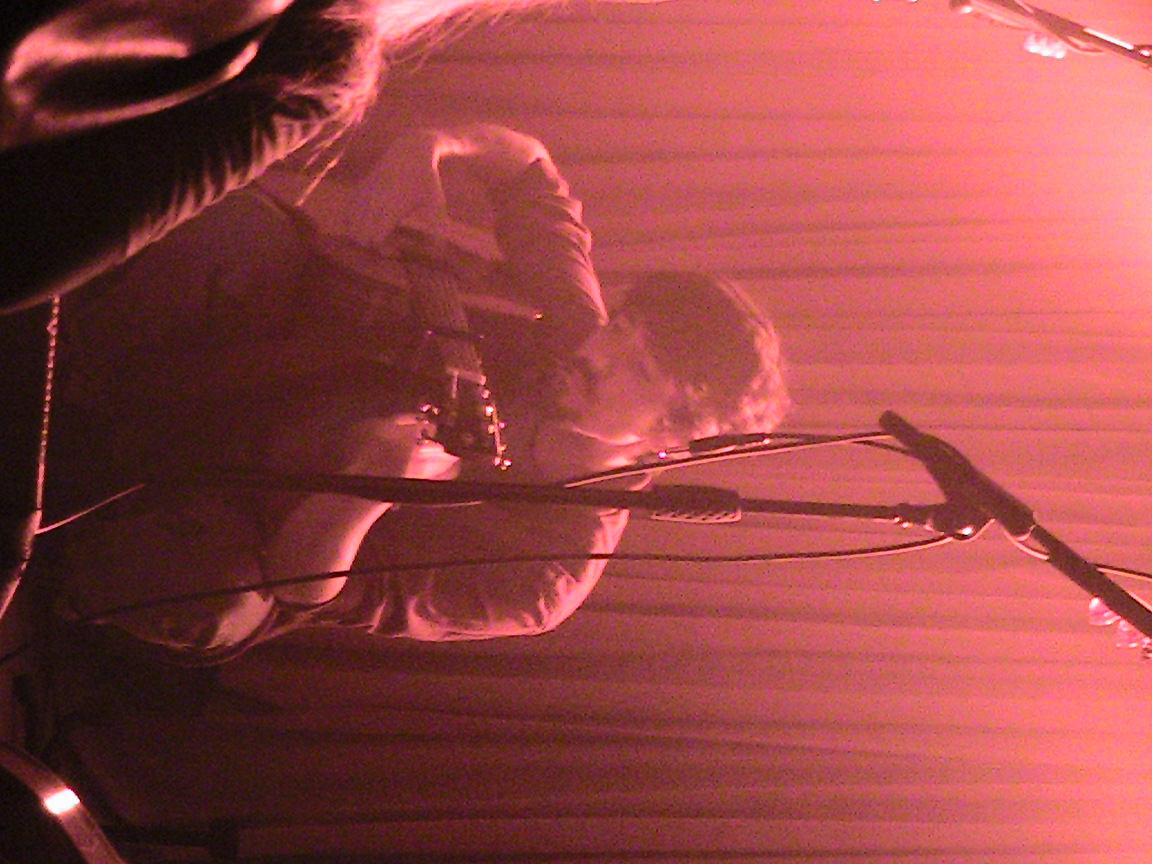 a picture of the artist on stage